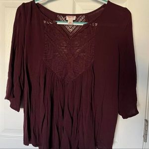 Flowy burgundy top with mesh lace details